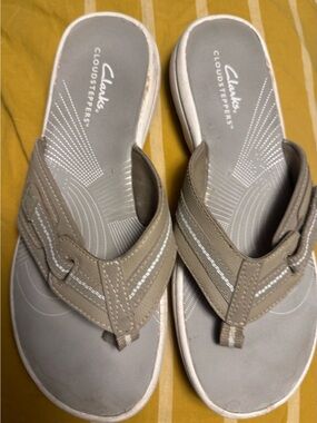 Clarks Gray Slip-On Sandals with Cream Logo Accent